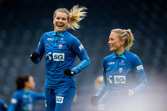 Ada Hegerberg and Guro Bergsvand of the Norwegian women's