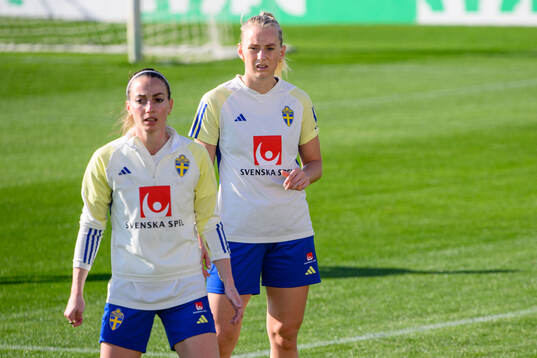 Kosovare Asllani and Stina Blackstenius of Sweden of the