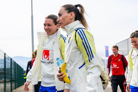goalkeeper Jennifer Falk and Kosovare Asllani of the