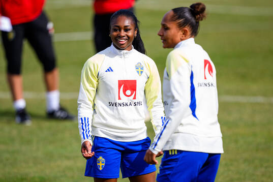 Monica Jusu Bah and Madelen Janogy of the women's national