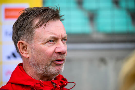 Head coach Peter Gerhardsson is interviewed by the media