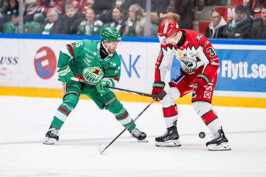 Rögles Simon Ryfors och Frölundas Nicklas Lasu