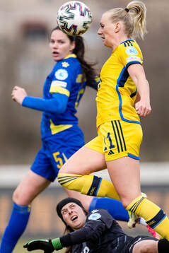 Stina Blackstenius of Sweden against goalkeeper Jelena