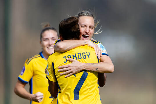 Nathalie Björn and Madelen Janogy of Sweden celebrate the