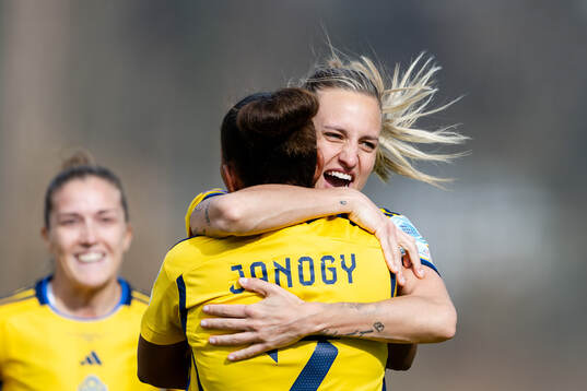 Nathalie Björn and Madelen Janogy of Sweden celebrate the