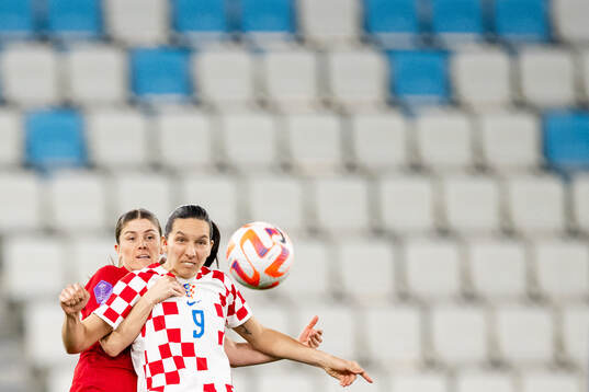 Maren Mjelde of Norway and Ivana Rudelic of Croatia