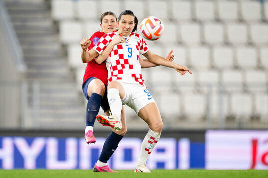 Maren Mjelde of Norway and Ivana Rudelic of Croatia