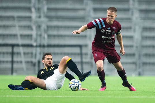 AIKs Benjamin Tiedemann Hansen och Gefles Martin