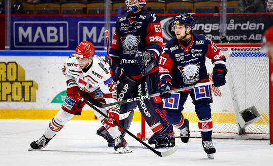 MoDos Josh Dickinson och Linköpings Jesper Pettersson