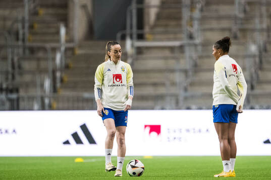 Kosovare Asllani and Madelen Janogy of Sweden