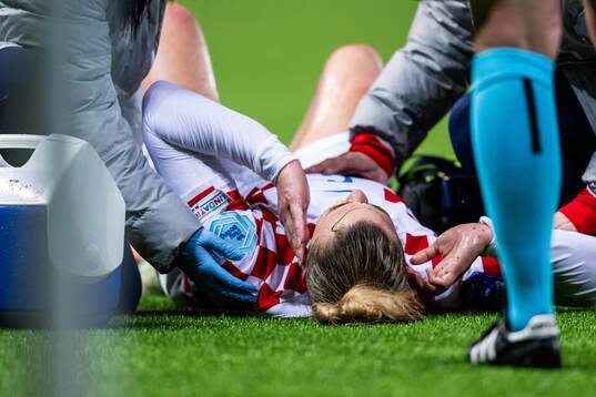 Tea Krznarić of Croatia receives attention due to injury