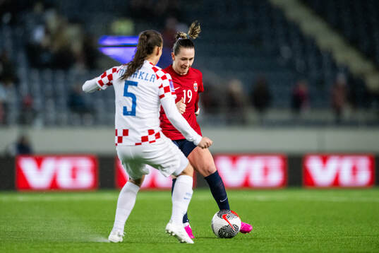 Kristina Nevrkla of Croatia and Elisabeth Terland of Norway