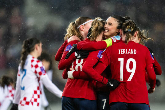 Frida Leonhardsen Maanum of Norway celebrates with Ingrid