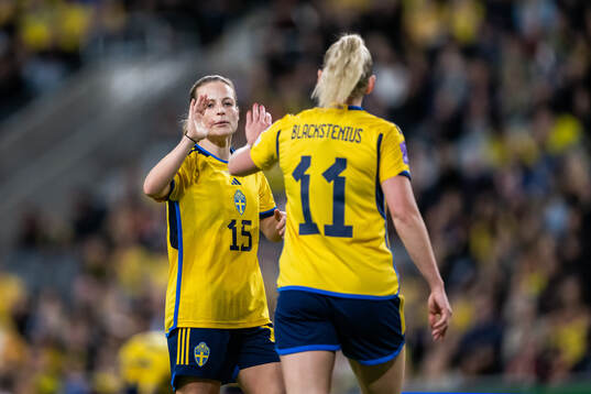 Anna Anvegård and Stina Blackstenius of Sweden