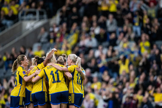 Matilda Vinberg of Sweden celebrates with team mates