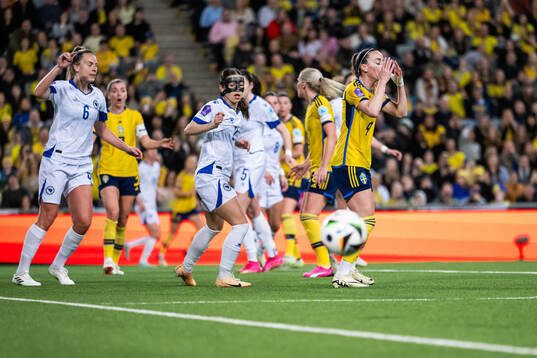 Kosovare Asllani of Sweden looks dejected