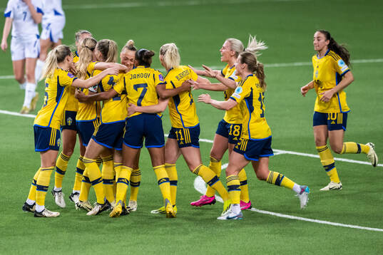 Matilda Vinberg of Sweden celebrates with team mates