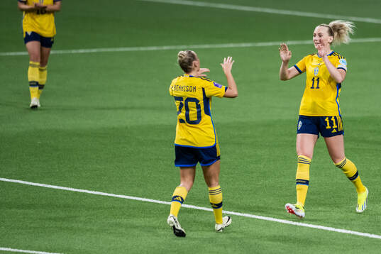 Hanna Bennison celebrates with Stina Blackstenius of Sweden