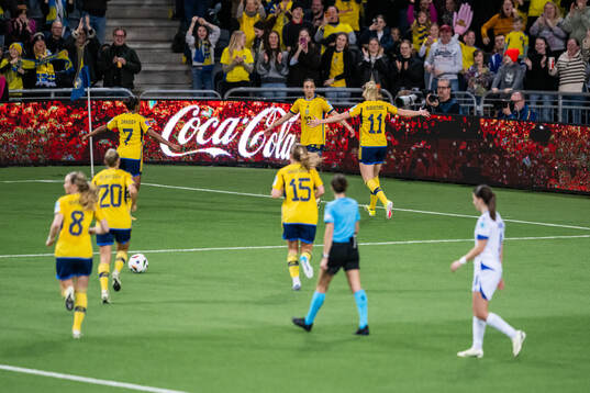 Rusul Rosa Kafaji of Sweden celebrates with team mates
