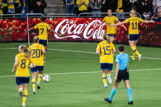 Rusul Rosa Kafaji of Sweden celebrates with team mates