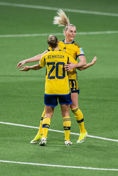 Hanna Bennison celebrates with Stina Blackstenius of Sweden