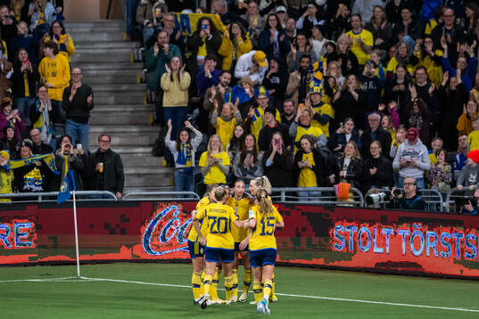 Rusul Rosa Kafaji of Sweden celebrates with team mates
