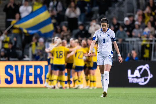 Milena Nikolic of Bosnia and Herzegovina looks dejected