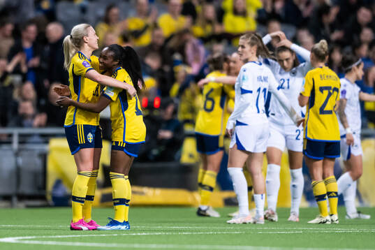 Josefine Rybrink and Monica Jusu Bah of Sweden celebrate