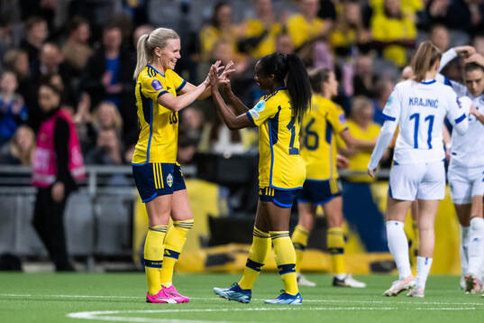 Josefine Rybrink and Monica Jusu Bah of Sweden celebrate