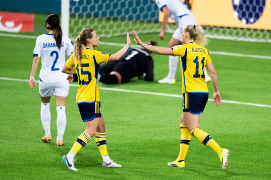 Anna Anvegård and Stina Blackstenius of Sweden