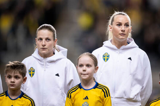 Anna Anvegård and Stina Blackstenius of Sweden