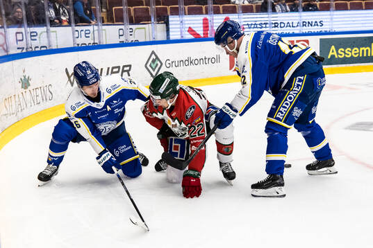 Leksands Patrik Norén och Frölundas Linus Nässen och