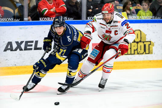 HV71s Herman Hansson och MoDos David Rundblad