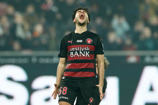 Aral Simsir of Midtjylland looks dejected