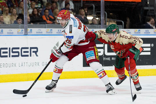 MoDos Sam Vigneault och Frölundas Tom Nilsson