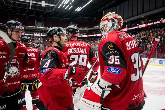 Malmö Redhawks Johan Olofsson och målvakt Adam Werner
