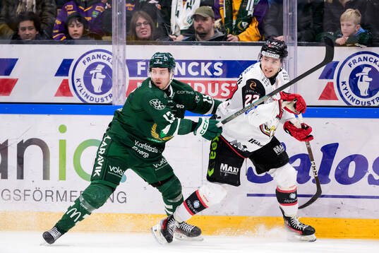 Färjestads Joel Kellman och Malmö Redhawks Janne Kuokkanen