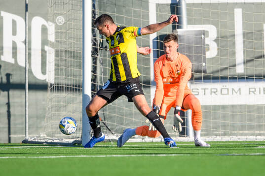 Häckens Even Hovland och målvakt Andreas Linde