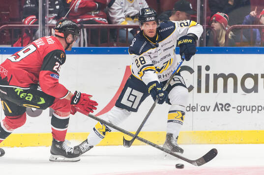 HV71s Joonas Nättinen och Malmö Redhawks Kim Rosdahl