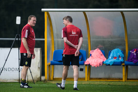 Assistant coach Remy Reijnierse and head coach Jon Dahl