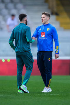 Viktor Gyökeres of Sweden greets a Portuguese player