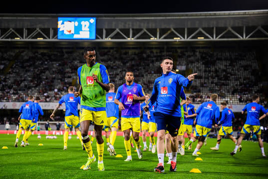 Alexander Isak and Physio coach Ben Rosen of Sweden