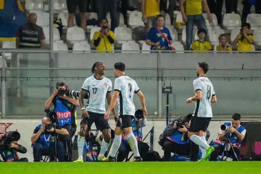 Rafael Leao of Portugal celebrate with Goncalo Ramos and