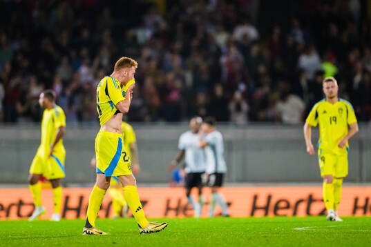 Dejan Kulusevski of Sweden looks dejected