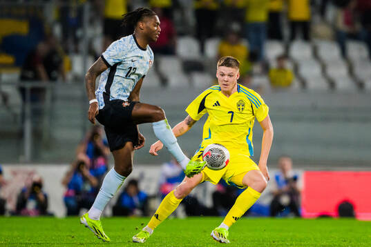 Rafael Leao of Portugal and Emil Holm of Sweden