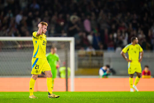 Dejan Kulusevski of Sweden looks dejected