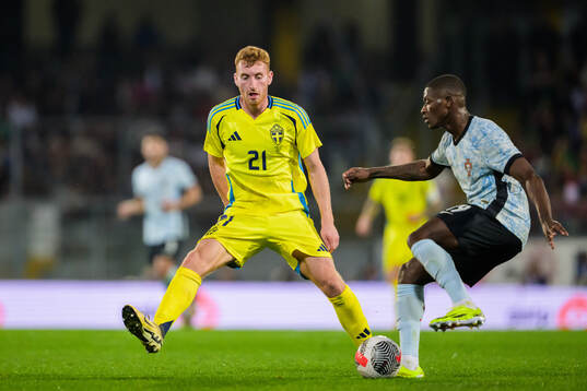 Dejan Kulusevski of Sweden and Nuno Mendes of Portugal