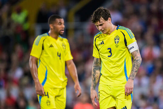 Victor Nilsson Lindelöf of Sweden looks dejected