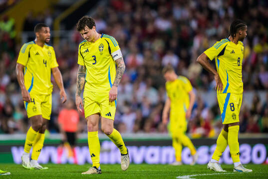 Victor Nilsson Lindelöf of Sweden looks dejected