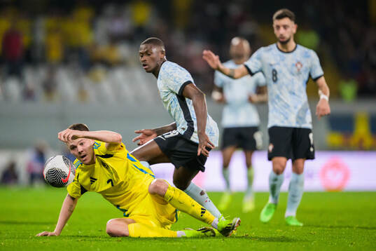 Emil Holm of Sweden and Nuno Mendes of Portugal